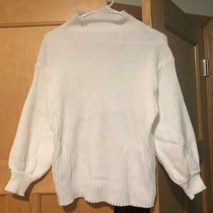 White knitted sweater